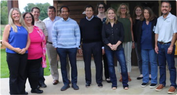 A group of people posing for the camera