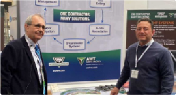 Two people in front of a LSRP poster